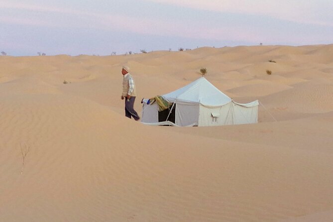 2 days tour to Douz & Ksar Ghilan oasis. and an overnight in the sahara under bedouin tent .. Dinner in the camp, Private Jeep - with english speaking guide. - The Overnight in a Bedouin-Style Camp: Sleep Setup and Real Comfort