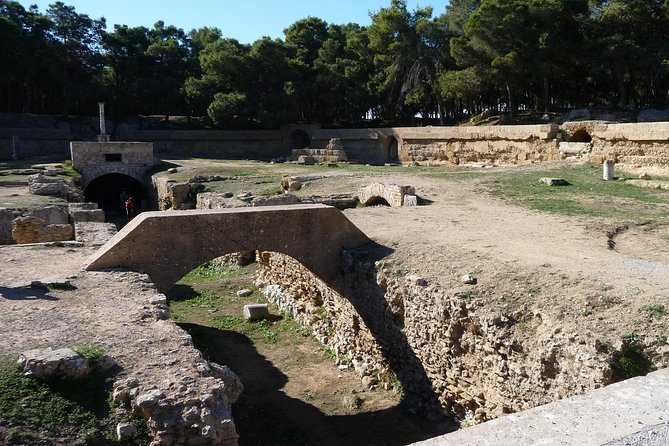Historical Tour of Ancient Carthage - Stop 2: Punic Ports & Museum, walking ancient waterfront ruins
